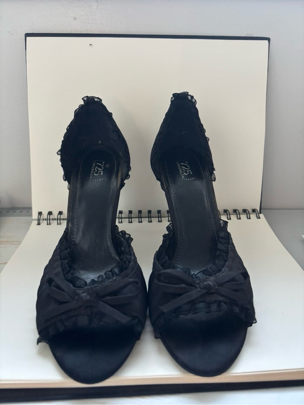 725 original black ruffle heels